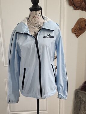 Hollister Light Blue Hooded Windbreaker with Black Trim
